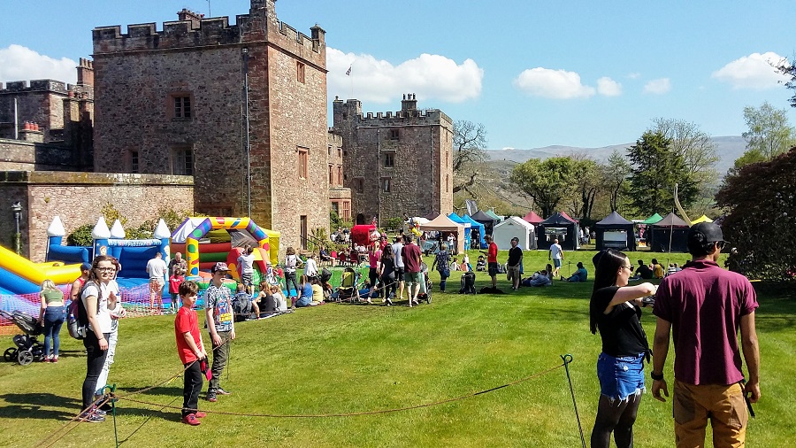 Archery and festival activities at Muncaster Castle, Ravenglass