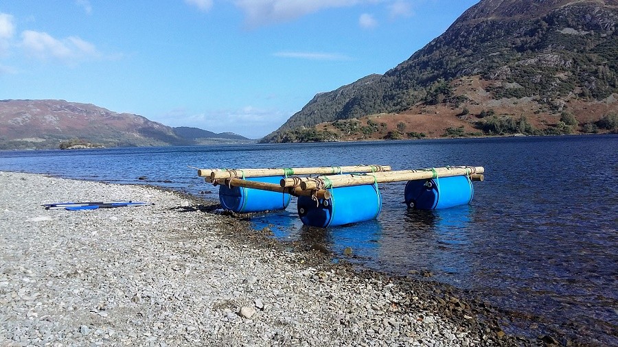 Raft with poles and barrels on Ullswater